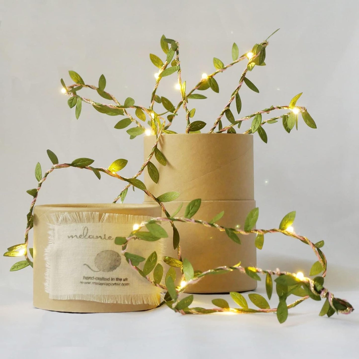 EShing Fairy Lights with Vines, USB Powered 33ft 100LED String Lights with 33ft Artificial Green Leaf Garland for Wall DIY Craft Party Wedding Home Decor (Warm)