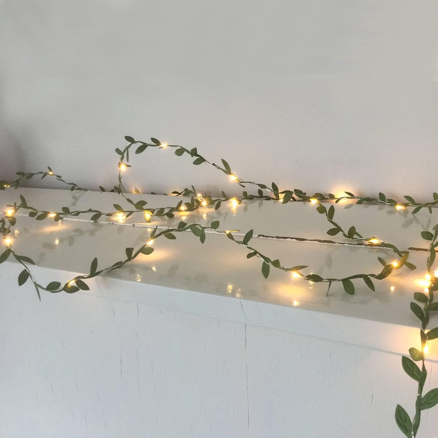 EShing Fairy Lights with Vines, USB Powered 33ft 100LED String Lights with 33ft Artificial Green Leaf Garland for Wall DIY Craft Party Wedding Home Decor (Warm)